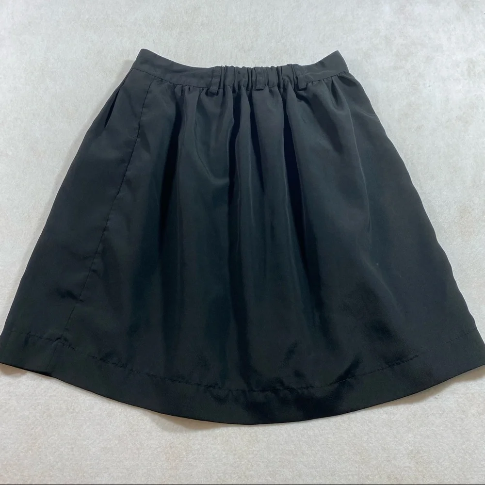 Xhilaration skirt womens black button up flowy ruffled elastic back mini…